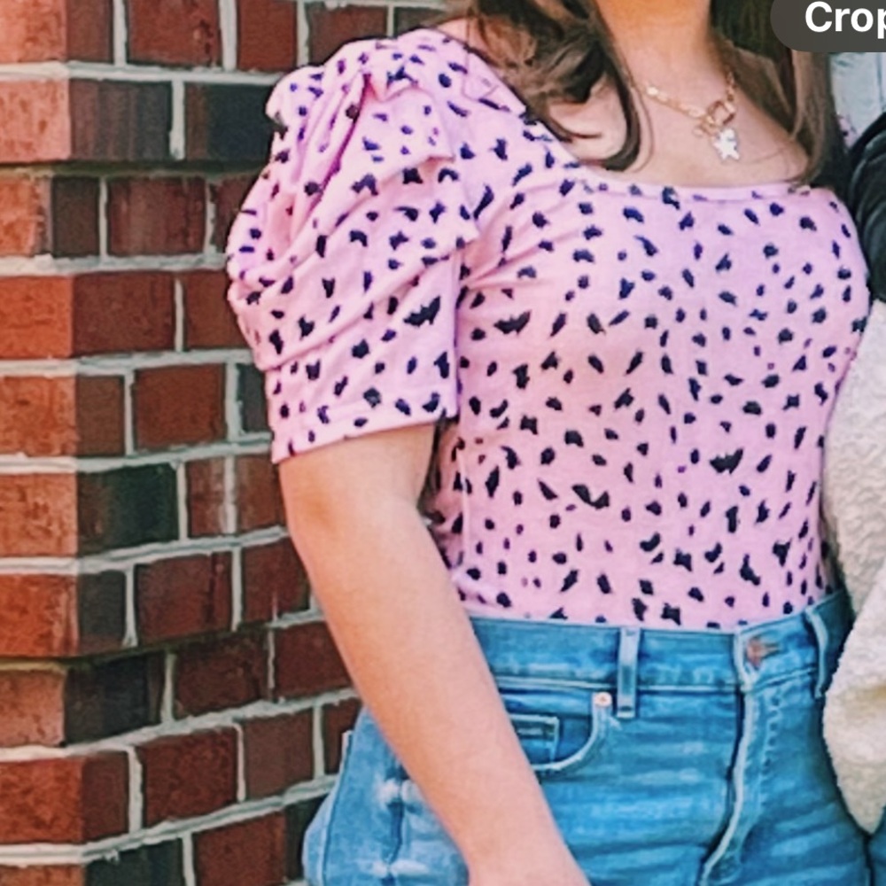 pink and black patterned top with cute short sleeves